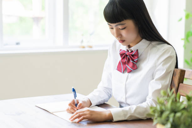 istock girl who study ,School uniform, 1453380750