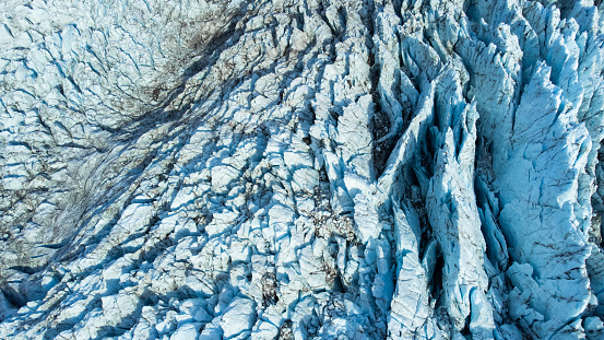 Glacier in Iceland, Pure Blue Melting Ice at Winter Season, Nature Landscape. Vatnajokull National Park and the Largest Glacier in Europe. Global Warming and Climate Change Concept. High quality photo