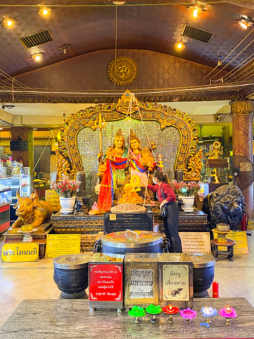 Bangkok Thailand - 28 Dec 2022: Many people praying to lord ganesh at Ganesha shrine or Phra Pikanet Temple in Huai Khwang Night Market Bangkok