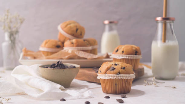 istock Chocolate chip muffins with milk 1453390794
