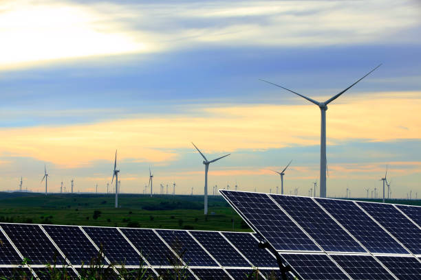 istock Solar photovoltaic panels and wind turbines 1453390910
