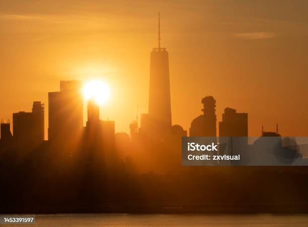 Manhattan Skyline Sunset Stock Photo - Download Image Now - New York City, Sunbeam, Architecture