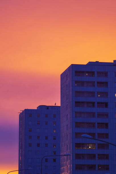 Low angle view of buildings against sky during sunset