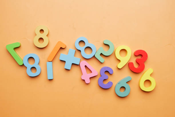 istock colorful plastic letters on white background, close up 1453392383