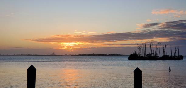 istock Winter Sunset on the Water 1453398473