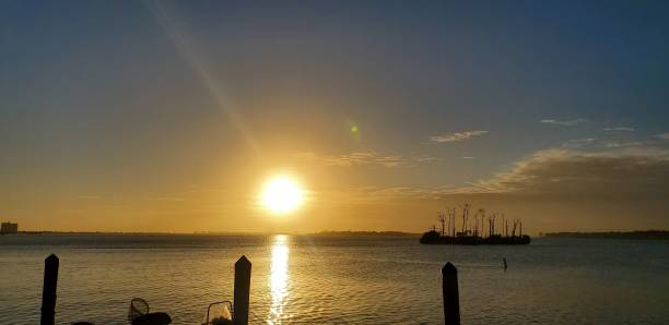 istock Winter Sunset on the Water 1453400144
