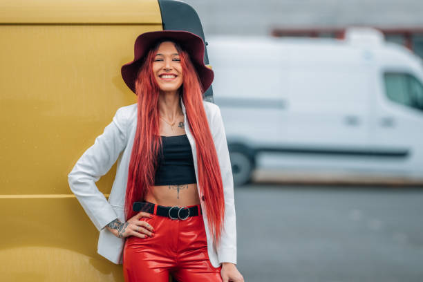 istock funky hipster girl with the van 1453414520
