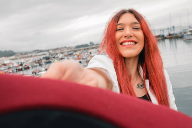 istock red-haired girl with hat smiling 1453414550