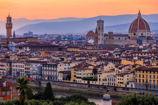 istock Sunset view with Duomo cathedral and Palazzo Vecchio Tower, Florence Italy 1453418206