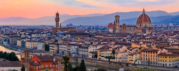 istock Sunset panorama with Duomo cathedral and Palazzo Vecchio Tower, Florence Italy 1453418207
