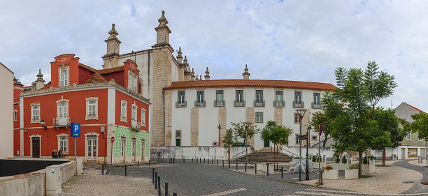 Leiria, Portugal – October 16, 2022: A Bertrand Bookshop and Se de Leiria in the historic center of Leiria, Portugal