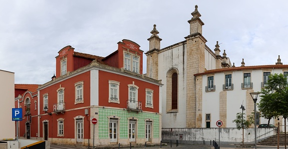 Leiria, Portugal – October 16, 2022: A Bertrand Bookshop and Se de Leiria in the historic center of Leiria, Portugal
