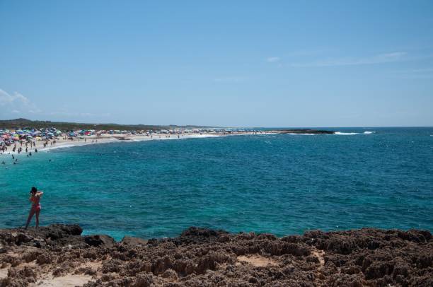 istock beach in Is Arutas. Sardinia, Italy 1453423909