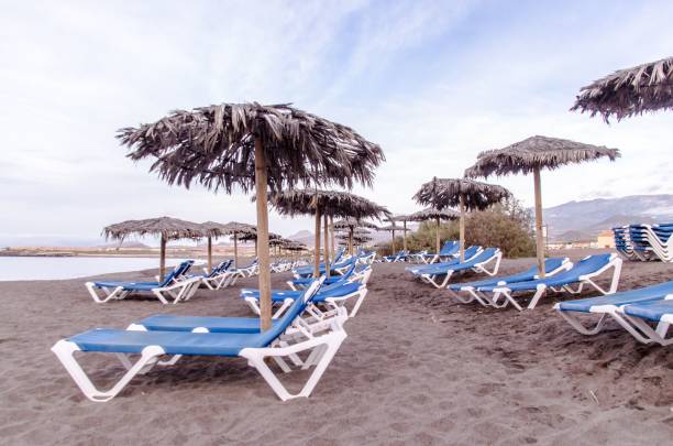 istock Sunbeds and Umbrella 1453431551