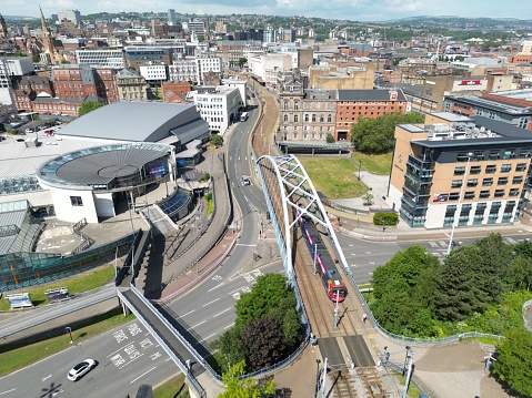 A high-angle drone shot of the Commercial Street Sheffield, UK