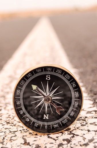 Travel Concept Compass on the Asphlat Road