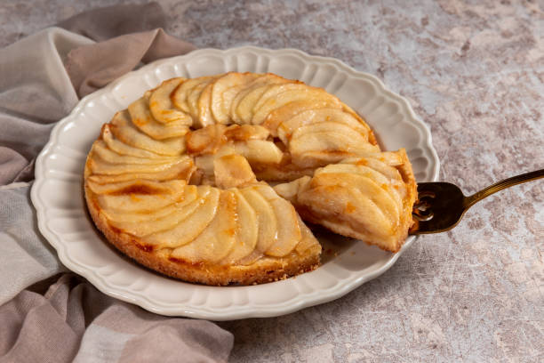 istock Delicious apple tart on concrete background 1453434280