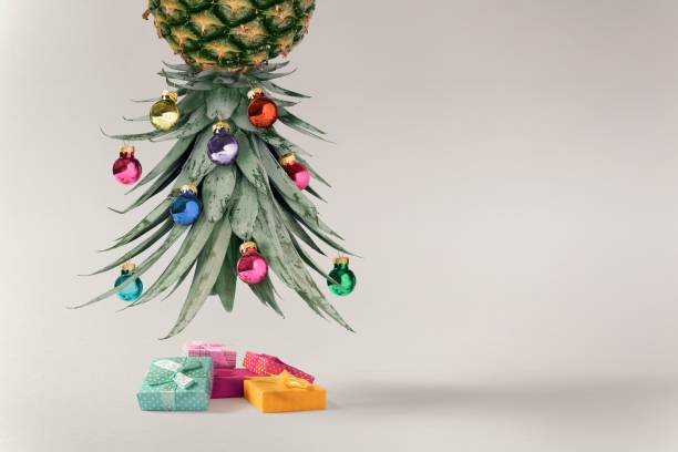 istock 3D rendering of a Creative New Year's composition with a pineapple and Christmas decorations 1453441232