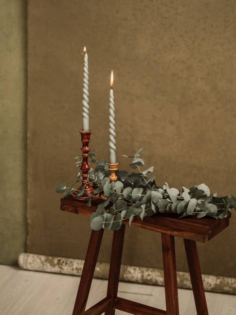 istock Candles and Eucalyptus leafs still life 1453443471