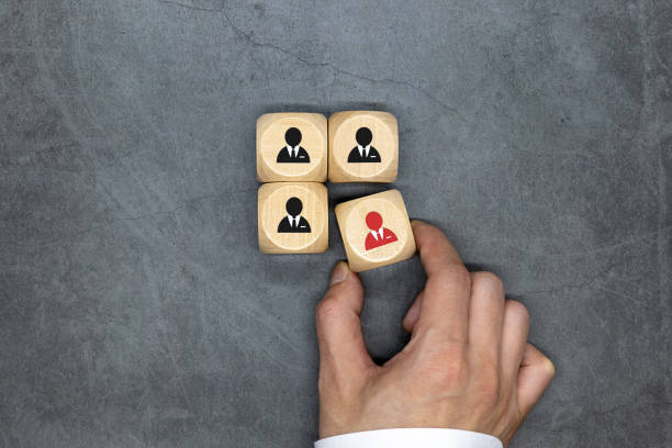 istock Man removing cube from table. Concept of dismissal 1453445412