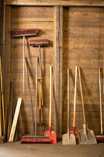 istock Tools arranged on old wooden wall in garage 1453458433