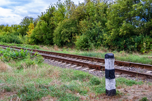 Photography to theme railway track after passing train on railroad, photo consisting of long railway track before fast movement train by railroad, railway transportation track for train at railroad