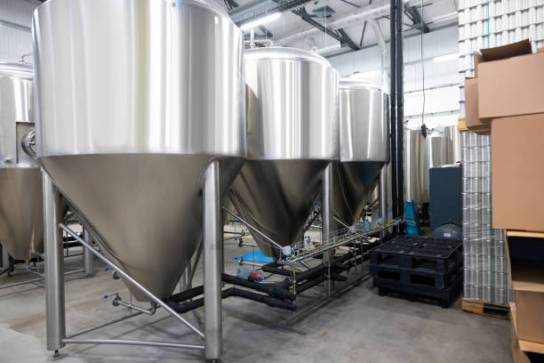 istock Modern interior of a beer plant with big vats 1453463837