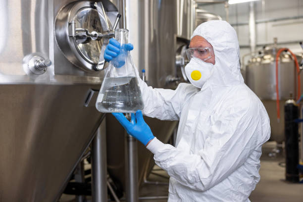 istock Brewer overseeing the beer production process in the factory 1453463911