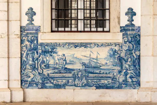 Panel of blue azulejos with a historic impression at the Courtyard of the church of São Vicente de Fora in Lisbon, Portugal, Europa.