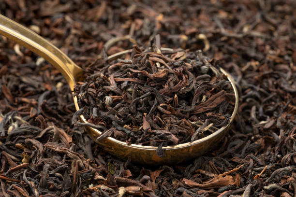 istock Indian Tukvar darjeeling dried tea leaves close up full frame 1453472961