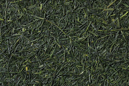 High quality Japanese Gyokuro sencha dried tea leaves close up full frame as background