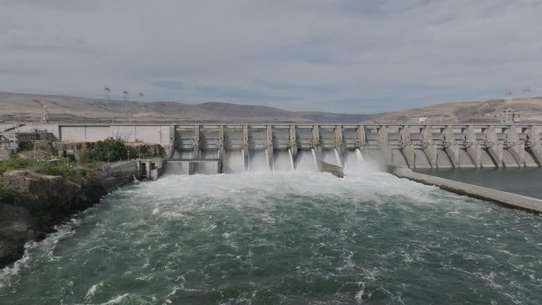 Drone aerial of a hydroelectric dam along the Columbia River. Shot on Mavic 3 Cine. 30 fps. 4k resolution. Prores.