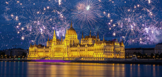fireworks display over parliament New Year celebrations in Budapest. Night view of the Parliament in the city of Budapest in Hungary