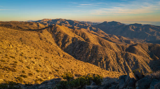 istock Joshua Tree National Park, Keys View summit at sunset, a high viewpoint with mesas, Coachella Valley, Palm Springs, and Salton Sea 1453479939