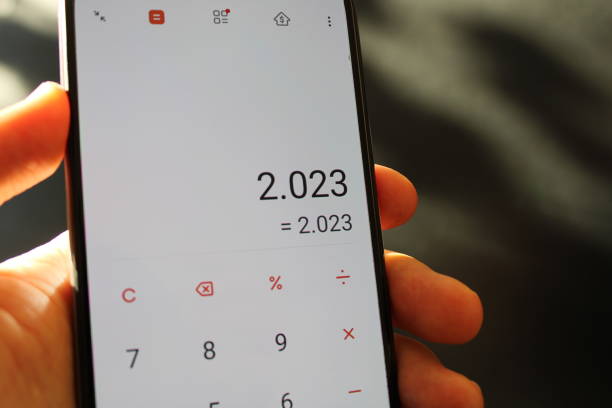 istock 2023 idea. happy new year concept. 2023 on the smart phone screen. 1453480936