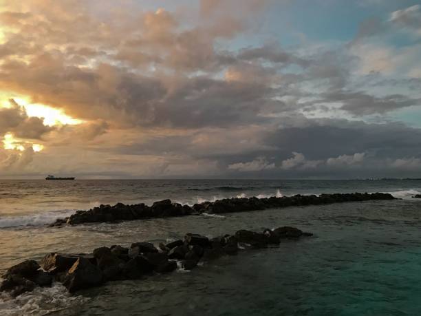 istock beautiful sunrise in Maldives 1453482637