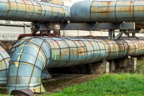 istock Thermal power plant with large water pipes. 1453491038