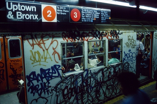 New York City, NY, USA, 1984. New York subway station. Also: passengers.