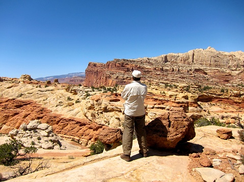 Stunning view from a ledge above Cohab Canyon along the Grand Wash Trail in Capitol Reef National Park, Utah. We found a perfect lunch spot in the shade next to a large boulder.