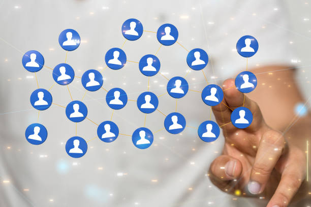 istock 3d rendering of human figures in blue circles connected with neural networks floating above a hand 1453498948