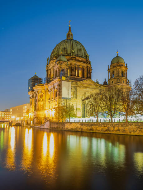istock Berlin Cathedral and lights reflection on Spree canal at night 1453506153