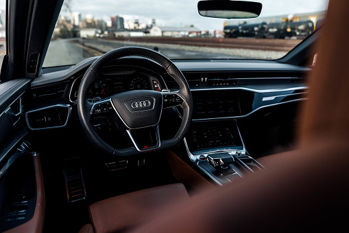 Seattle, WA, USA\nJanuary 1, 2023\nGreen Audi RS6 showing the interior and the steering wheel