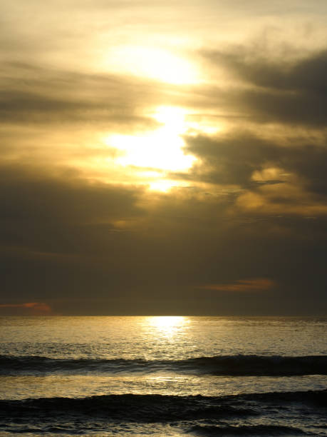 istock Sunshine and breaking waves - Color Portrait Format 1453517293