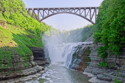 The Genesee river runs through western New York and Letchworth state park known as the grand canyon of the east. Large granite cliffs, waterfalls, and abundant hiking make this state park a popular tourist attraction in the east.