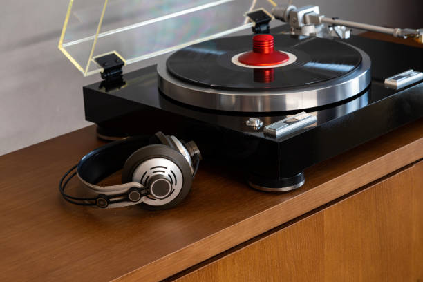 istock Vintage Stereo Turntable Vinyl Record Player with Open Plastic Lid 1453519440