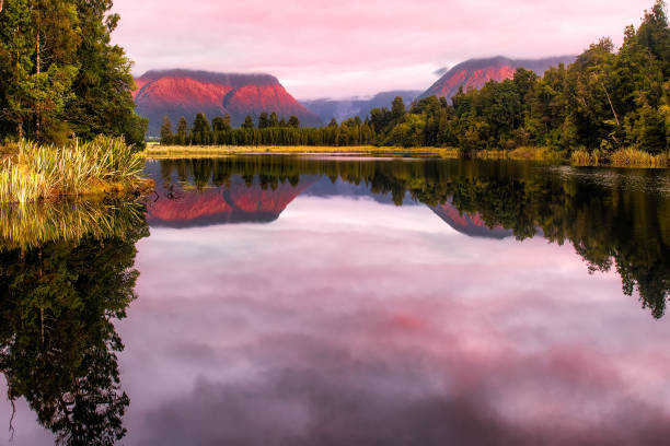 The beauty of Lake Matheson even when the Southern Alps peaks and their reflections are obscured with cloud