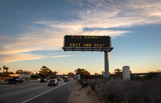 Digital traffic sign warning of driving while sleepy