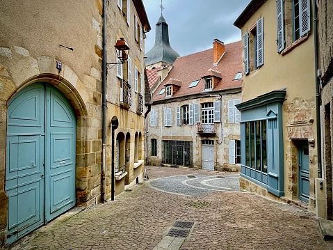 Montlucon, France - 8/18/21: A color photograph of an empty street in Medieval City, Montlucon, France