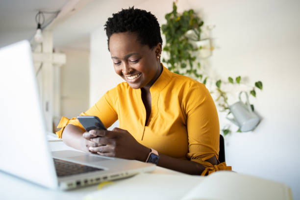 istock Young woman working from home 1453523644