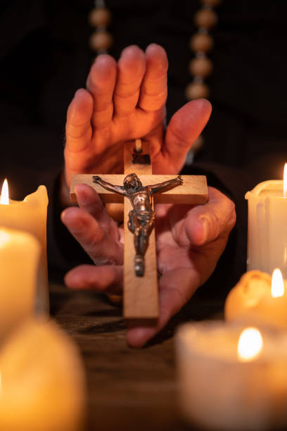 istock A priest with a cross in his hand 1453523935